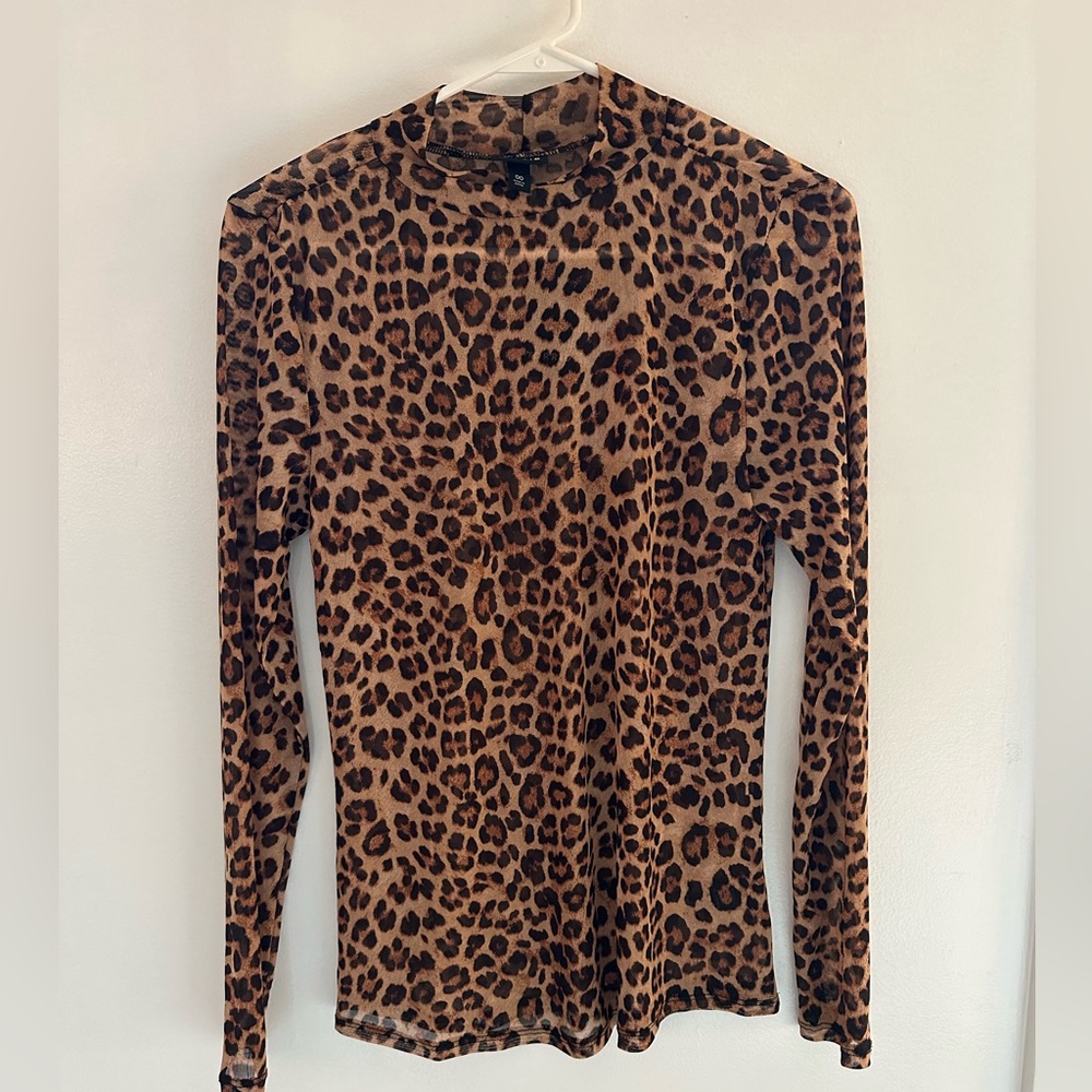Torrid new with tags Womens sheer leopard long sleeve top